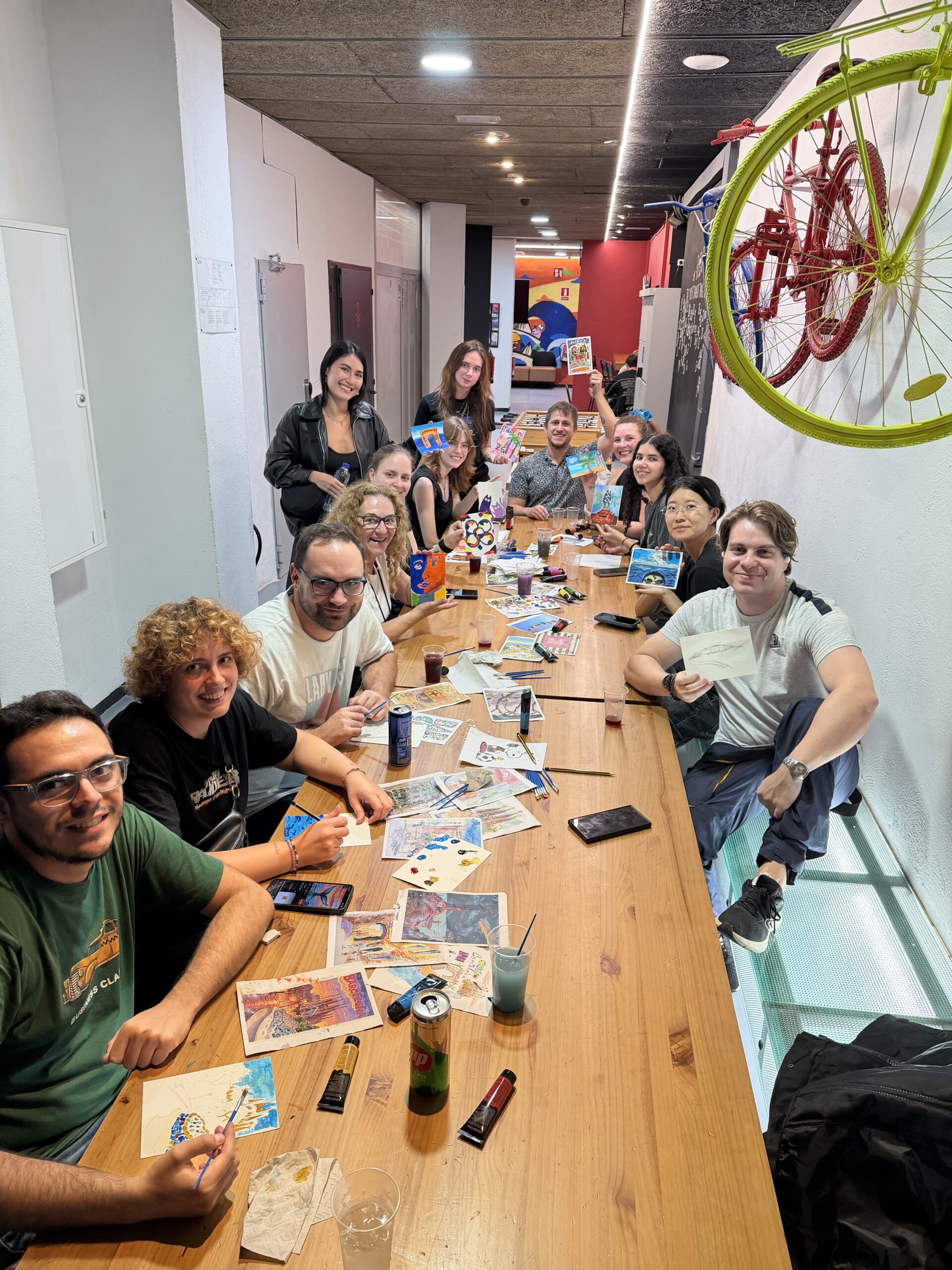 Group at a long table during Sip and Paint