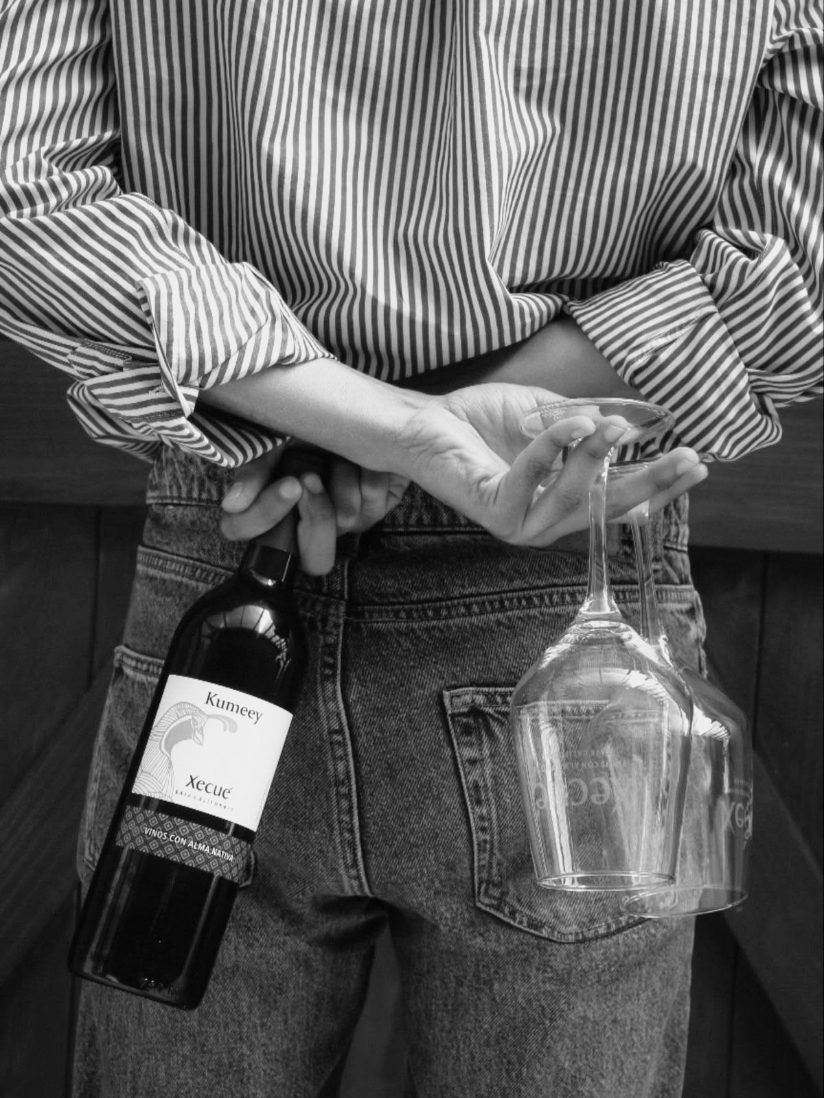 A bottle of wine and two glasses